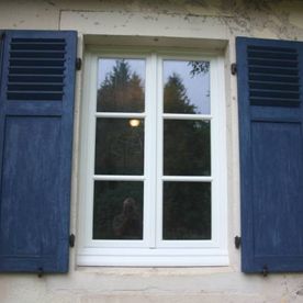 Raamdesign blauwe shutters